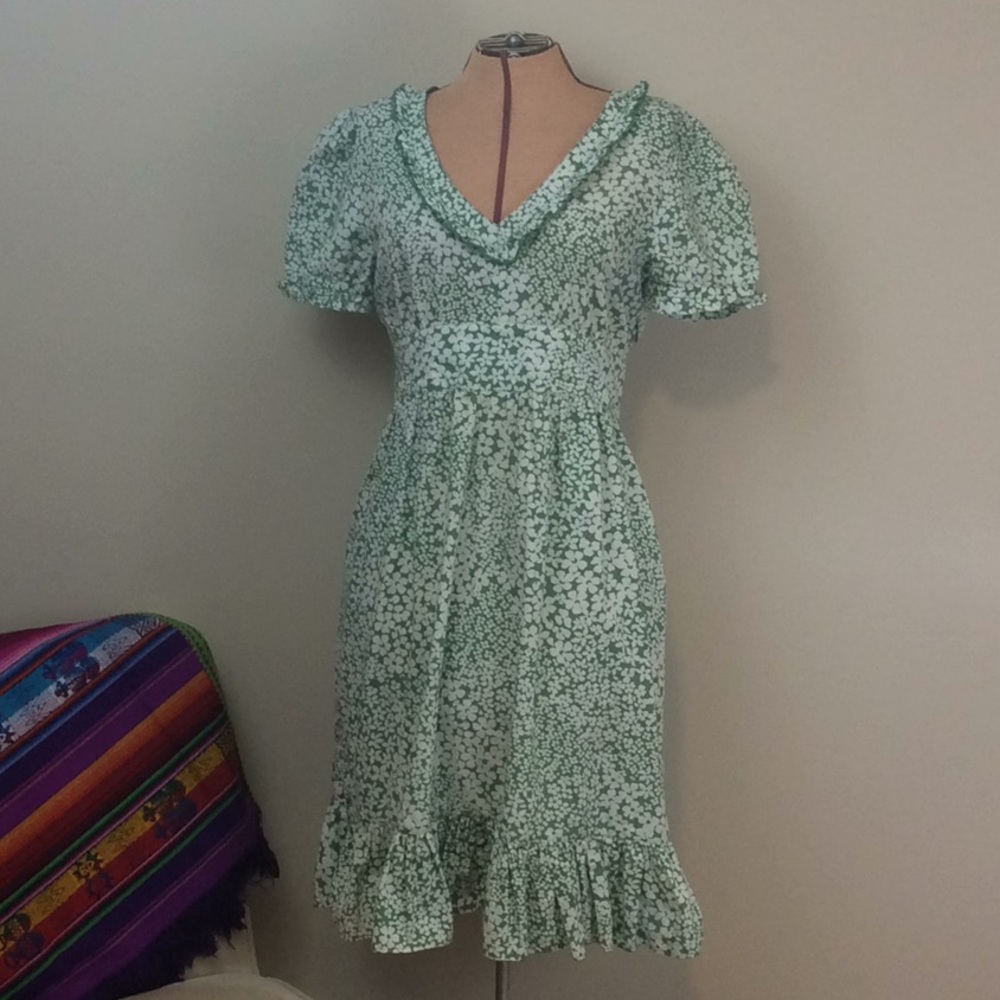 Ashley Judd green, floral, ruffles dress